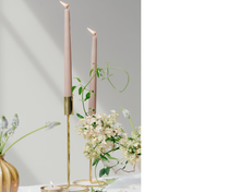 Charger l'image dans la galerie, Photo of two taper candles on a white tablecloth with flowers