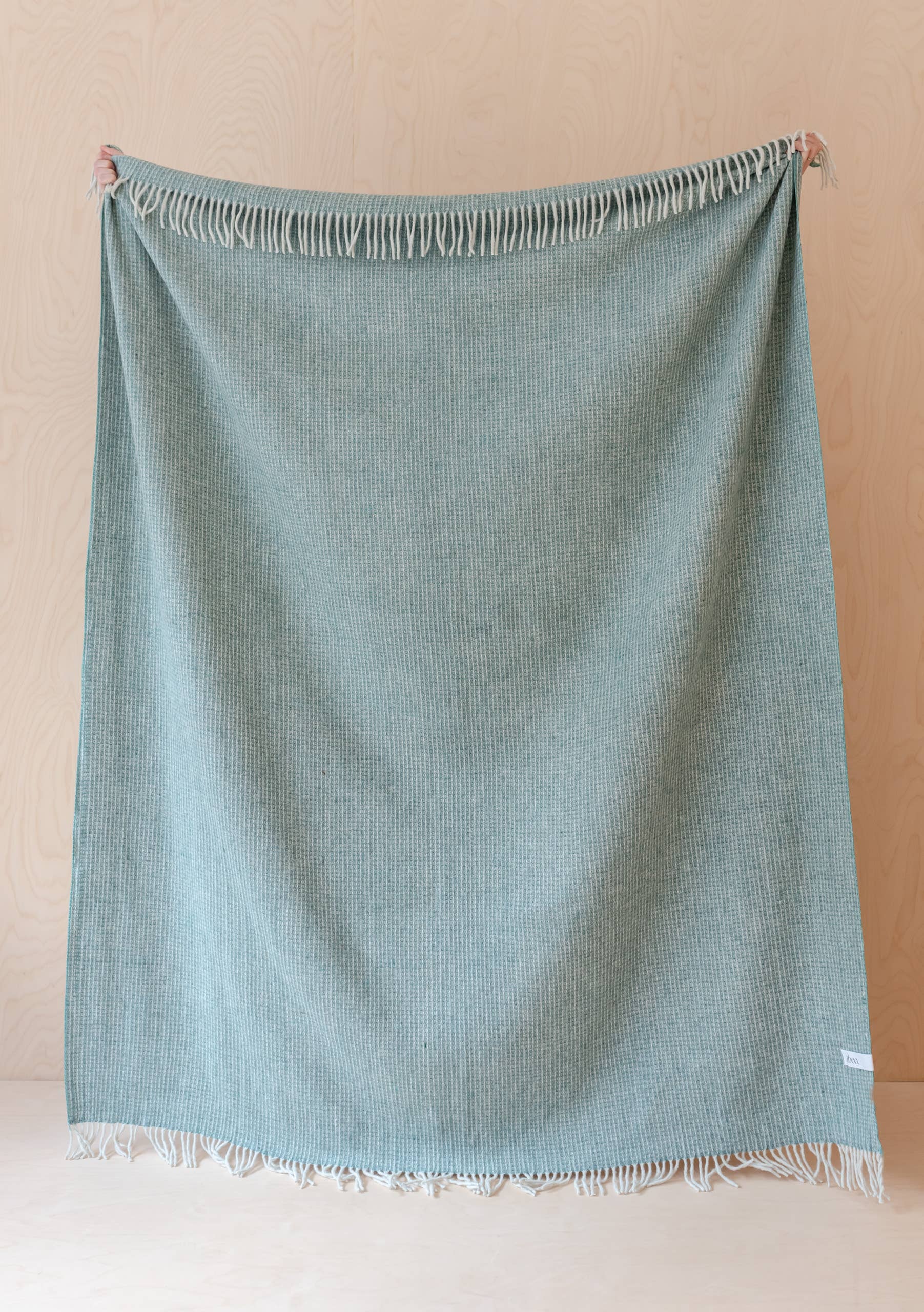 Couverture en laine recyclée gaufrée couleur sauge