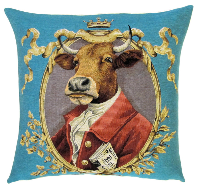 A pillow with a cow in a jacket holding a newspaper. 