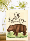 Text of A Big Thank You with an image of a hippo. 